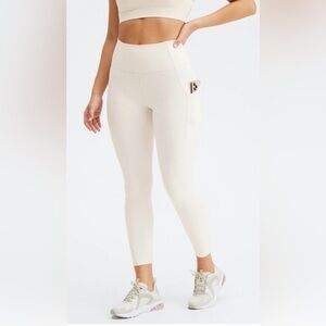 Fabletics Oasis Shine  High-Waist Pocket 7/8 Leggings